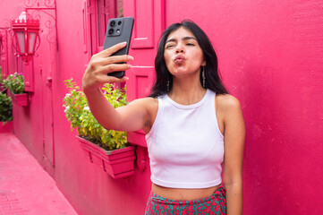 Tourist taking selfie with smartphone in Puerto plata, Republic dominicana