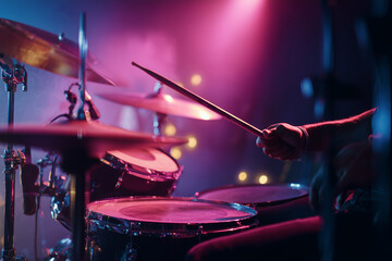 Obraz premium Drummer Drum Stage - Drummer playing with a hand on the drums in a
