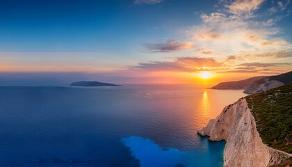 Fototapeta premium witness a serene zakynthos sunset where vibrant colors blend over calm seas