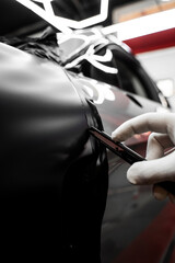 Full Panel Car Vinyl Wrapping. Large-scale vinyl wrap installation transforms the vehicle exterior...
