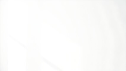 Minimalist white textured wall with subtle shadows and negative space