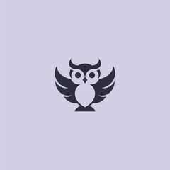Creative owl logo in clean and artistic silhouette illustration.