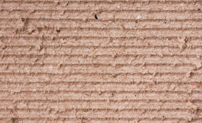 Brown color eco recycled kraft paper sheet texture cardboard background.