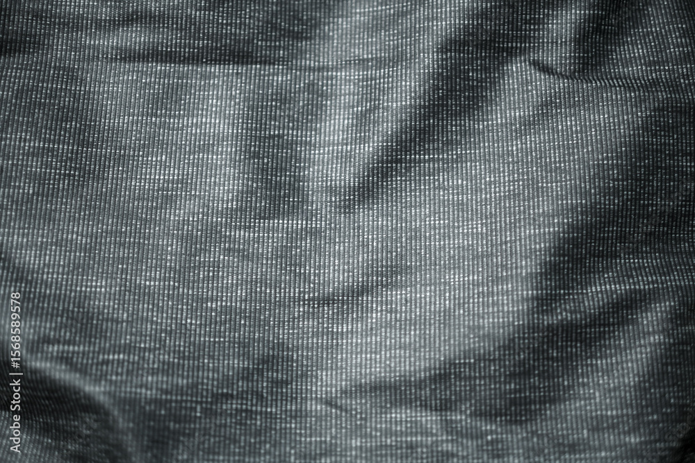 Poster an abstract view of turquoise fabric with a subtle ribbed texture creating depth and visual interest