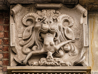 Medieval stone panel with lion and royal coat of arms
