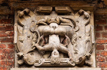 Medieval stone panel with lion and royal coat of arms