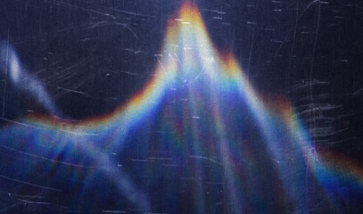 Blur colorful warm pink rainbow light leaks on black background. Defocused abstract analog retro...