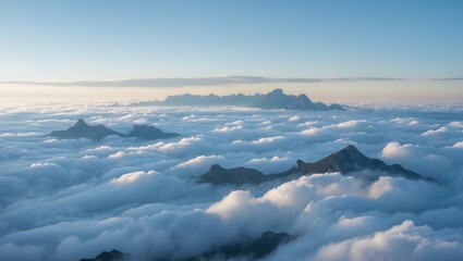 Naklejka premium A stunning view of a sea of clouds stretching endlessly, with mountain peaks emerging like islands in a calm ocean of white