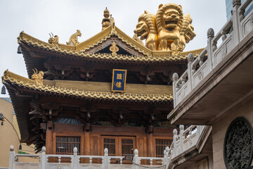 Ornate pagoda roof at Jing'an Temple, a Buddhist temple in Shanghai, China. Built in 247 AD, it...