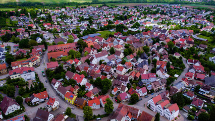 Aerial panoramic view of the city Güglingen in Germany on a cloudy noon in spring.