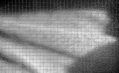 Iron net and glass window texture background.