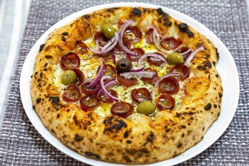 The best and most perfect pizza in the world, pizza with calabresa sausage and red onion, traditional Brazilian pizza. Vera pizza