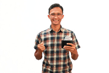An Asian man holding a wallet full of money with a happy expression