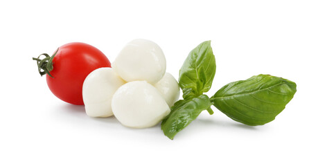 Tasty mozzarella cheese balls, tomato and basil on white background