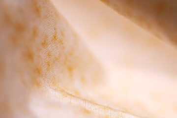 Brown stain appear on white stored cloth due to poorly ventilation