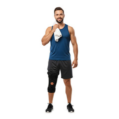 Athletic man with knee brace resting after workout