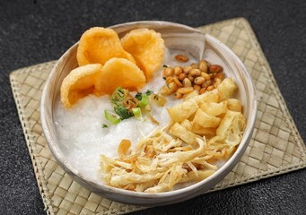 Bubur ayam. Chicken porridge is a typical Indonesian dish made from rice cooked in lots of water