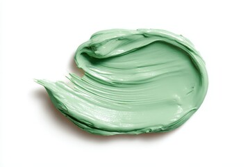 Sample the texture of a green cream kaolin mask for face and body on a plain white background Room for text