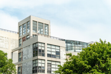 A corner of a modern glass office building