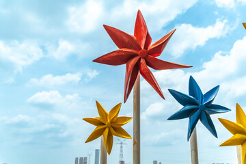Windmill decoration under the blue sky