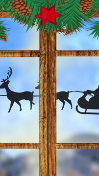 Animated Christmas decor with Santa silhouette on winter landscape.