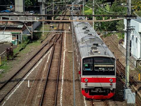 Aerial View of Commuter Train on Railroad Tracks