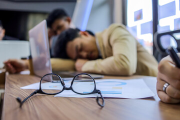 Business People Sleeping in The Conference Room During a Meeting