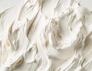 Close-up of creamy, swirled, white gelato texture.