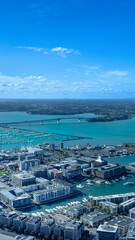 Scenic panoramic views of Auckland skyline and financial downtown city center.
