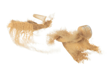 Cosmetic container white bottle fly splashing in mid air. Moisturizer lotion cream bottle explosion flying with sand powder dust under dry sun. White background isolated high speed shutter freeze