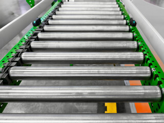 Industrial conveyor system transporting items efficiently in a warehouse setting during the day