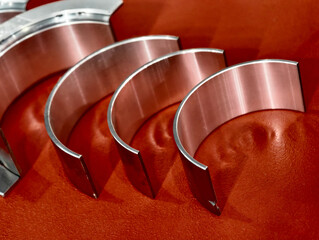 Detailed view of connecting rod bearings showcasing precision engineering and durability for...