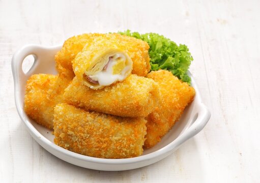 Risol Mayo or Risol mayonnaise is a traditional roll-shaped snack that has various fillings, from ragout, eggs, to smoked beef.
