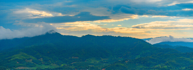 Banner Beautiful Mountain landscape foggy mountain green landscape morning sunrise. Amazing...
