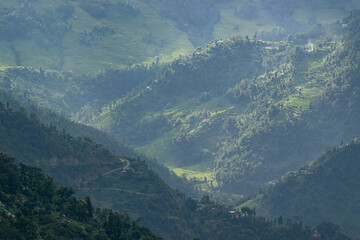 Beautiful Sun rays falling on Himalayan mountain range, play of light, scenic beauty of Okhrey, sikkim, India. Okhrey village a remote place in Sikkim where mountain range view is enjoyed by tourists.