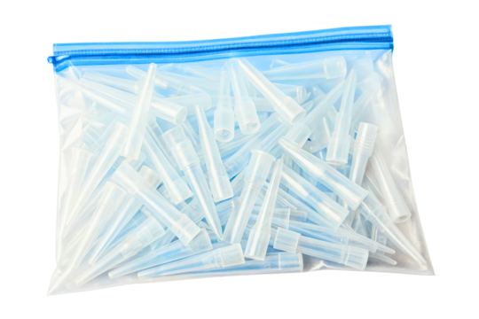 Resealable plastic bag full of disposable pipette tips isolated with transparent background