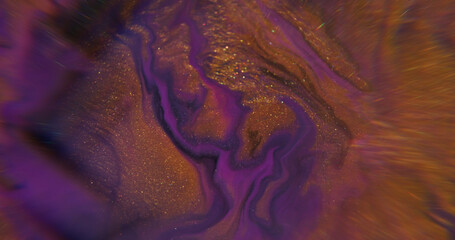 Fluid spill. Water art. Defocused purple golden neon color splash paint in liquid shiny dark black...