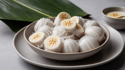 Boiled taro slices drizzled with thick coconut cream
