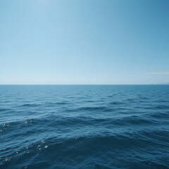 Obraz premium Wide panoramic view of a calm sea under a bright blue sky, minimal waves and endless horizon, peaceful tone, high detail, 8k quality