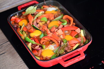 Czech Baked Dish with Vegetables, Sausage, and Egg in a Red Roasting Pan – Hearty Comfort Food...