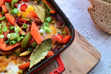 Traditional Czech Lecsó with Sausage, Egg, and Peppers – Close-Up of Rustic One-Pot Summer Meal...
