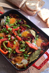 Czech Baked Dish with Vegetables, Sausage, and Egg in a Red Roasting Pan – Hearty Comfort Food from the Oven