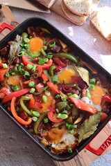 Czech Baked Dish with Vegetables, Sausage, and Egg in a Red Roasting Pan – Hearty Comfort Food from the Oven