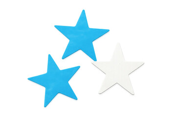 Obraz premium Two light blue and one white paper stars creating a festive atmosphere on a transparent background