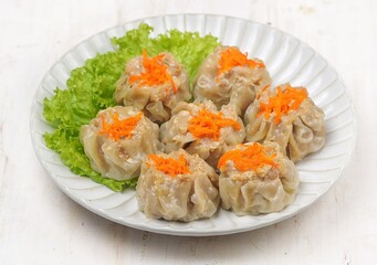 Siomay, Shumai or Shumay is a type of dimsum which is a traditional Chinese food.
