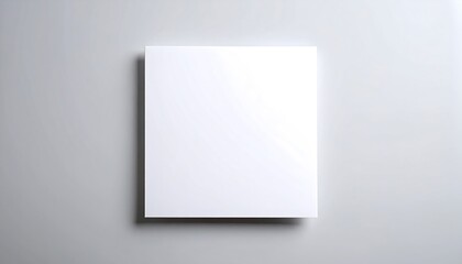 Blank white paper on light gray surface