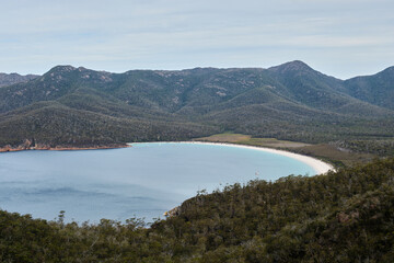 The iconic crescent shaped beach from the Wineglass Bay Lookout - Freycinet Peninsula, Tasmania, Australia