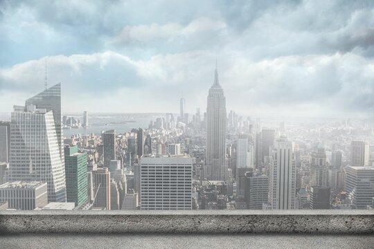 Flat design showing Manhattan skyline rising above concrete rooftop railing with river