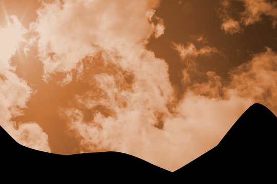 Fototapeta Dark silhouette hills are rising across flat design landscape under glowing sun and fluffy clouds