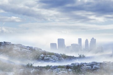 Flat design showing modern high-rise skyline emerging from dense fog on rocky hillside with shrubs